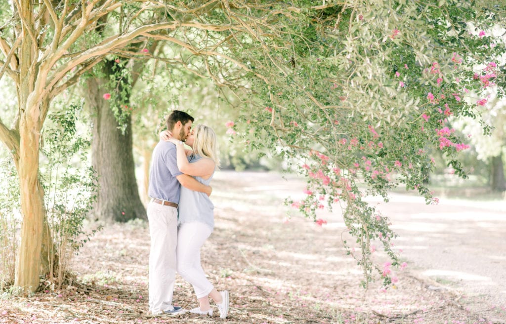 couple during engagement session at LSU Botanical Garden